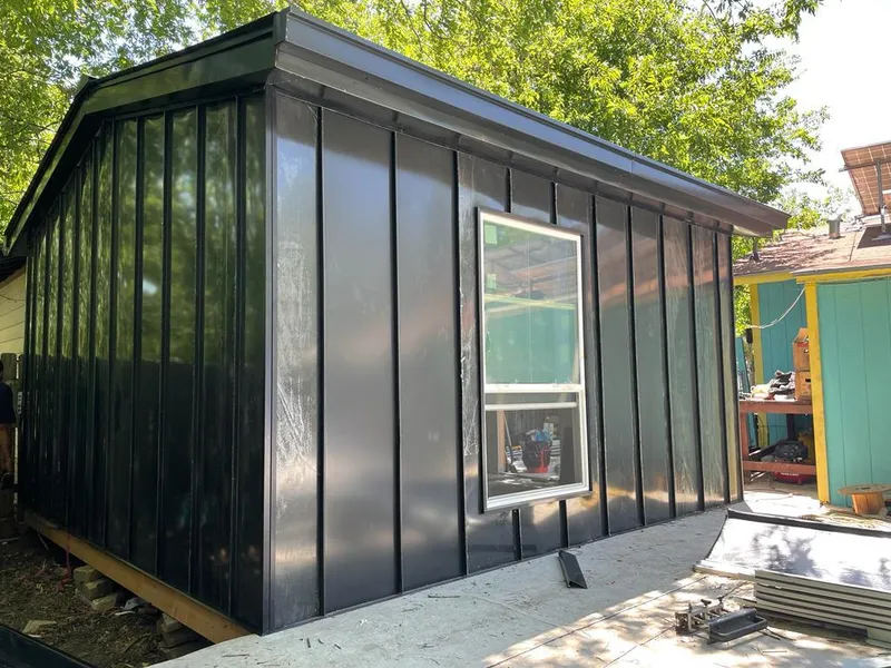 Black standing seam metal wall panels for Roof Inspection in Brentwood